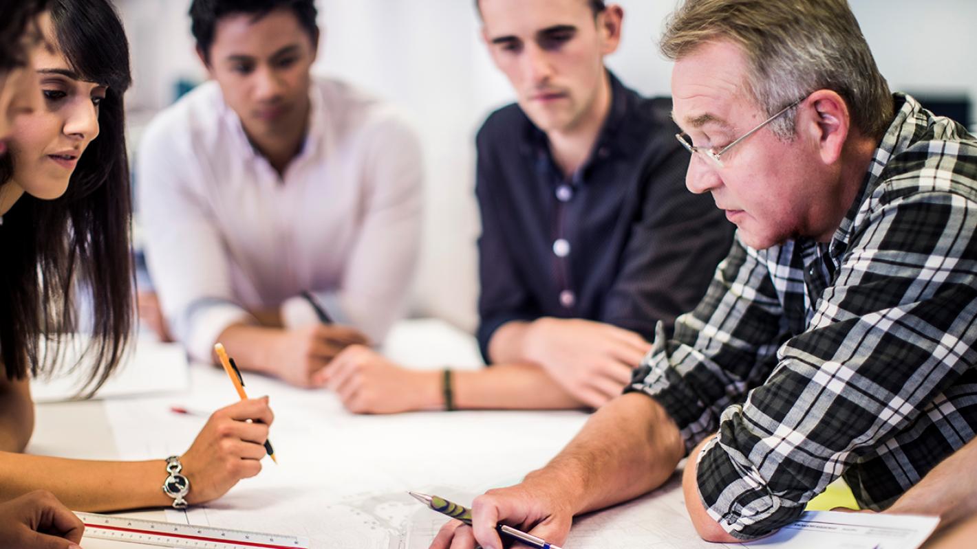 Graduates at work in the office